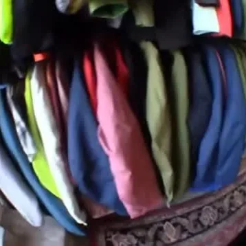 Fisheye shot of a rack of colorful jackets, the shop is ready for skiing